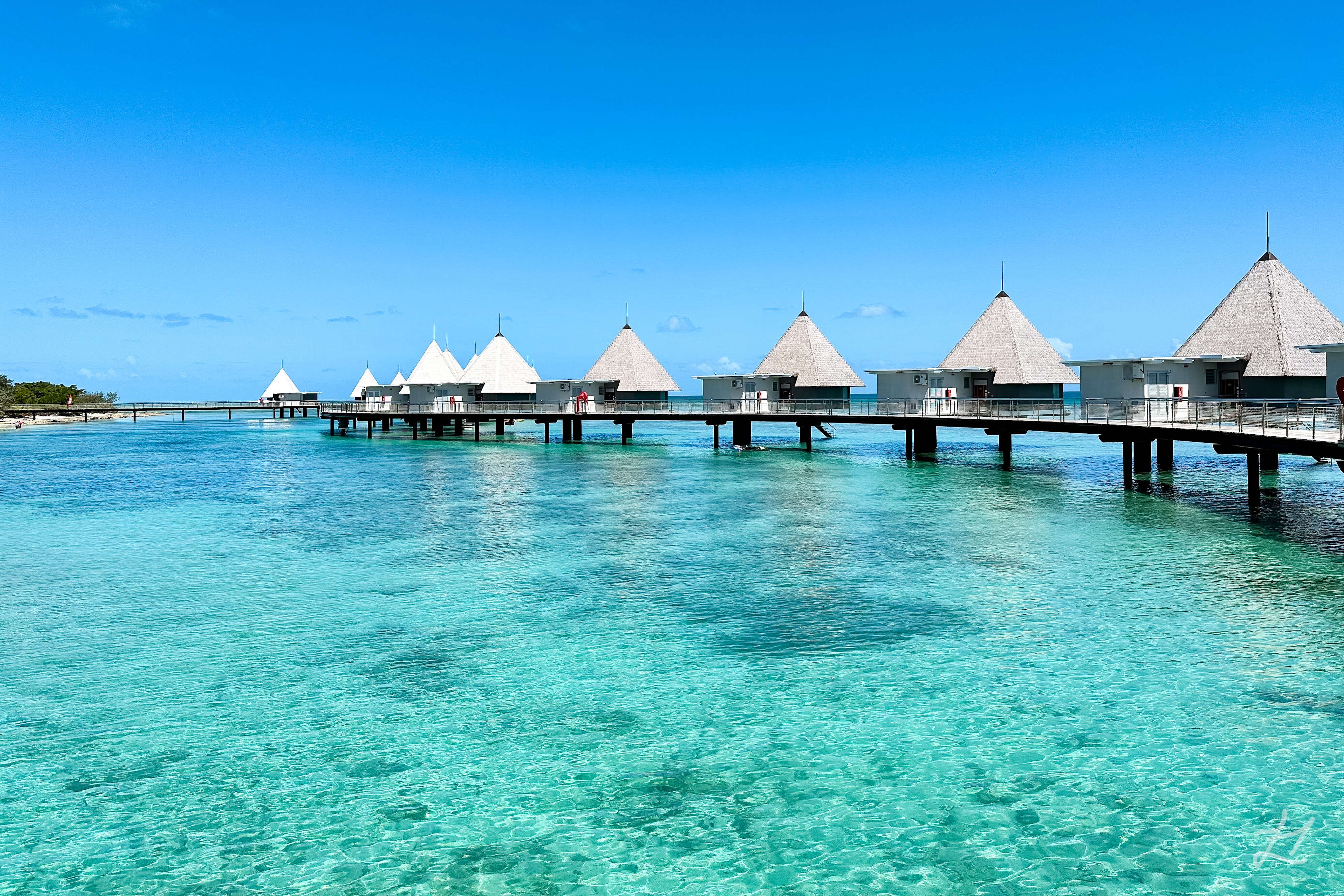 DoubleTree by Hilton Noumea Ilot Maitre Resort Overwater Bungalows and coral reef