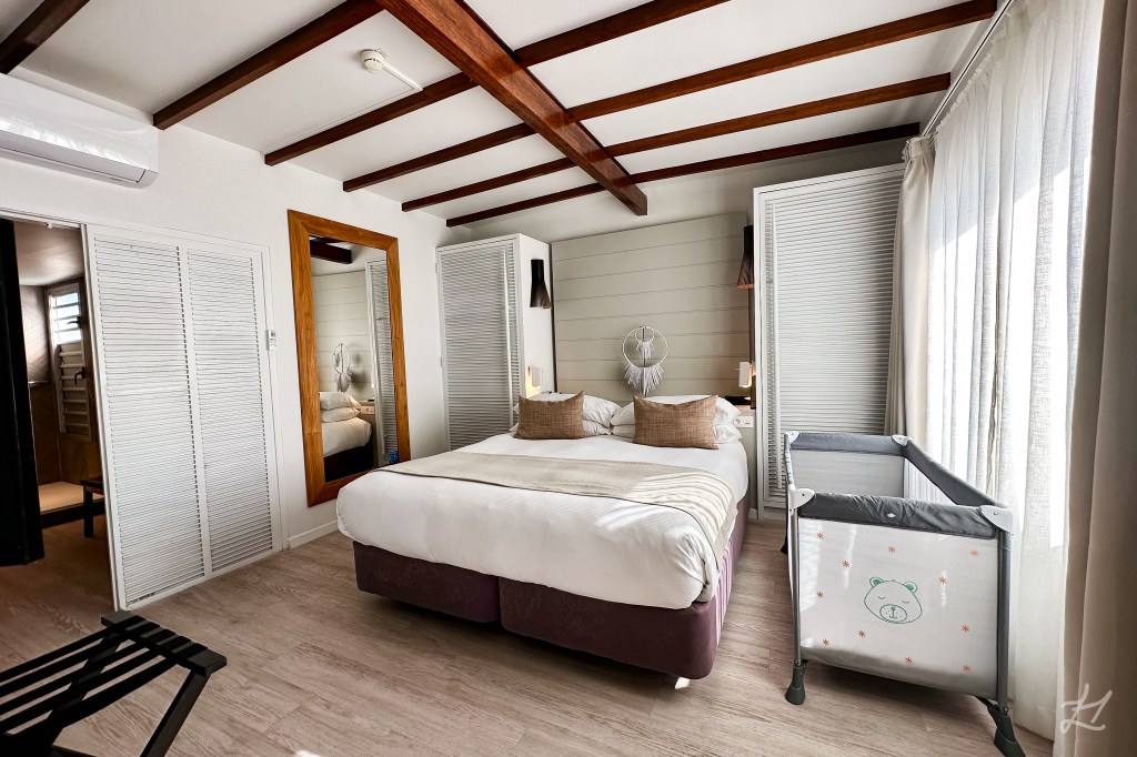 Overwater Bungalow Bedroom with cot DoubleTree Noumea