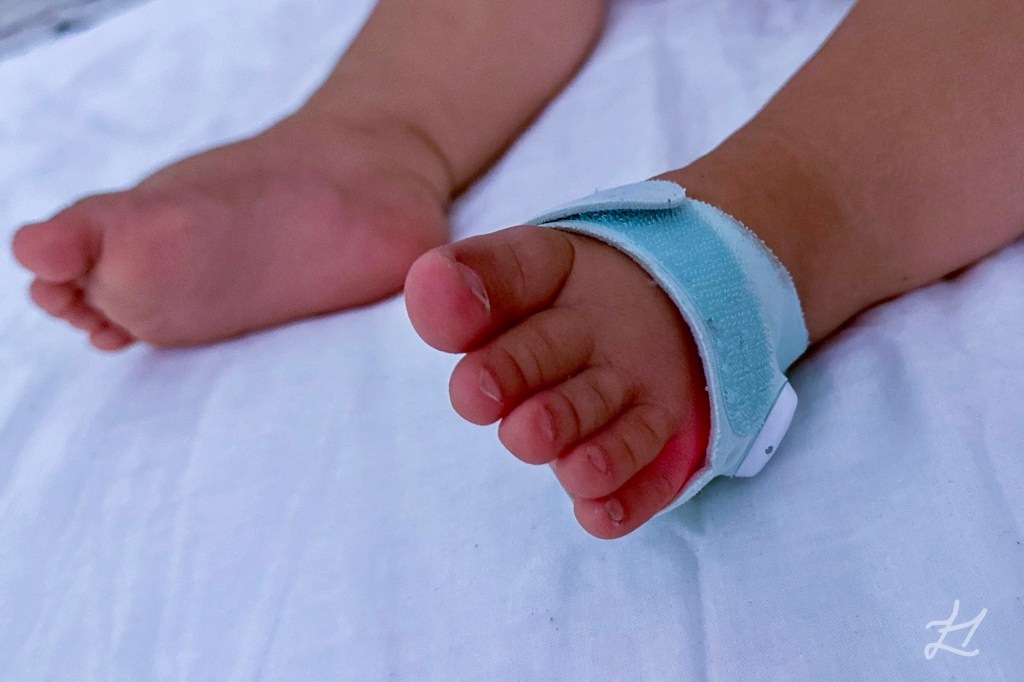 Kaydence wearing the Owlet Sock v3