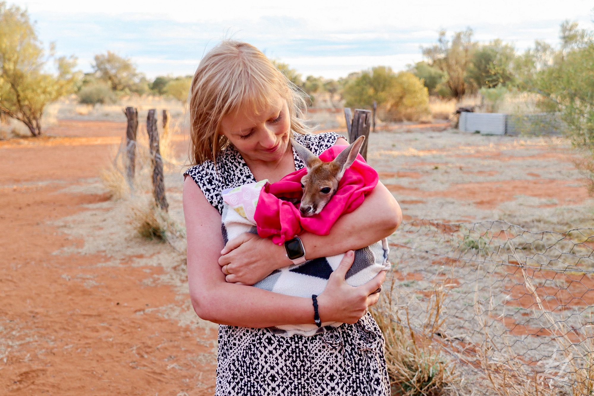 Me holding Katy-Lou the joey at the Kangaroo Sanctuary