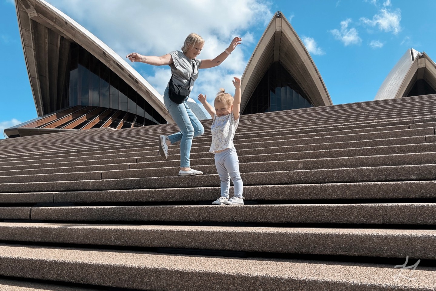 Kaydes and I having fun on the steps of the Sydney Opera House